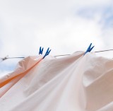 Strong wind blows the clothes hung on the clothesline --- Image by © Royalty-Free/Corbis